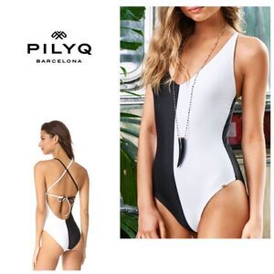 New. Pilyq Black and white one piece.￼